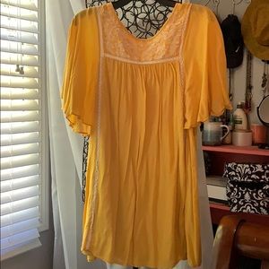 Yellow shift dress with lace detail